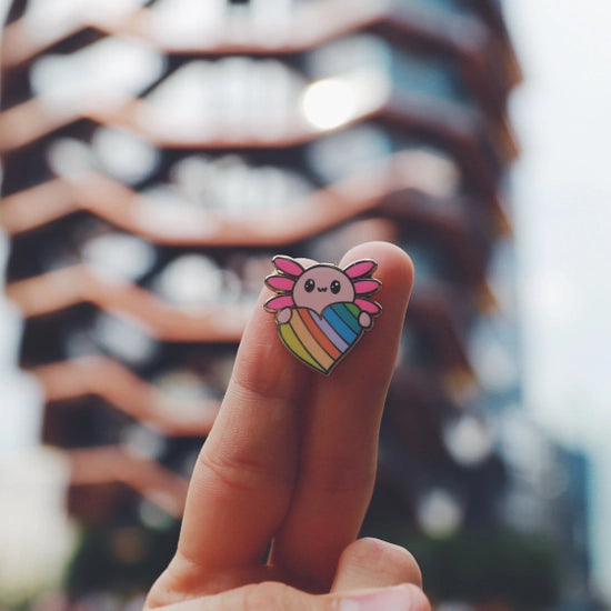 Axol the Axolotl Holding a Rainbow Heart enamel pin