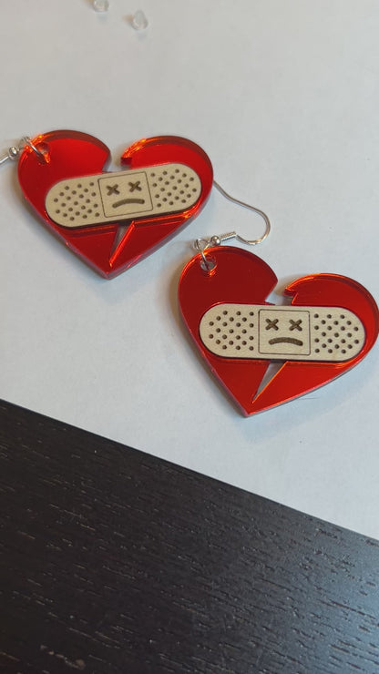 Snow Such Things Bandaid Broken Heart Earrings